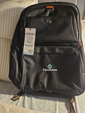 solo Black Backpack with Orange Accents - TripAdvisor Logo